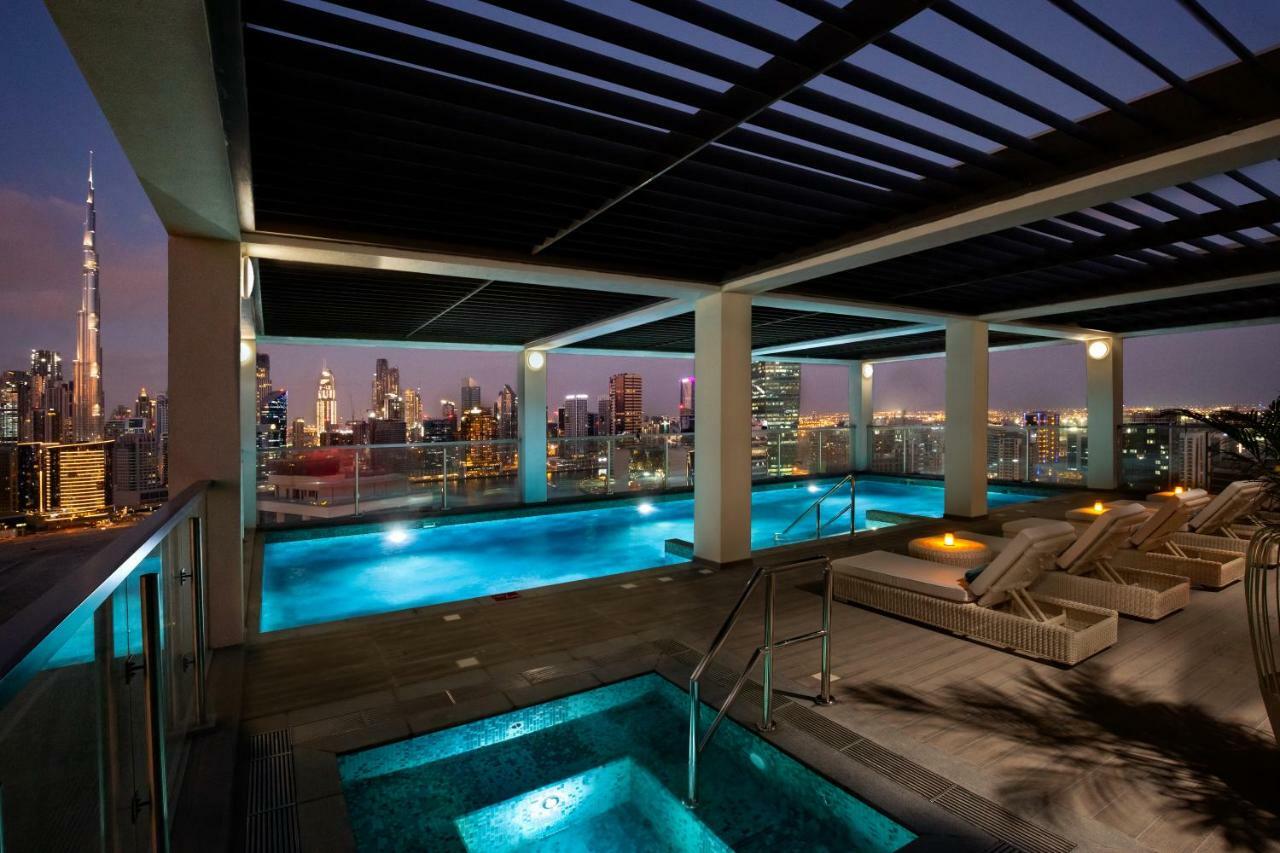 Millennium Atria Business Bay Aparthotel Dubai Luaran gambar The swimming pool at the Address Downtown
